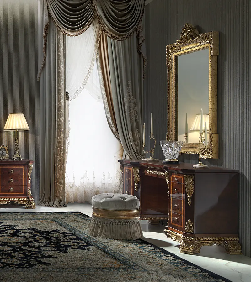 Classic bedroom dressing table with mirror handcrafted in Spain featuring elegant wood finishes and luxury bedroom furniture design