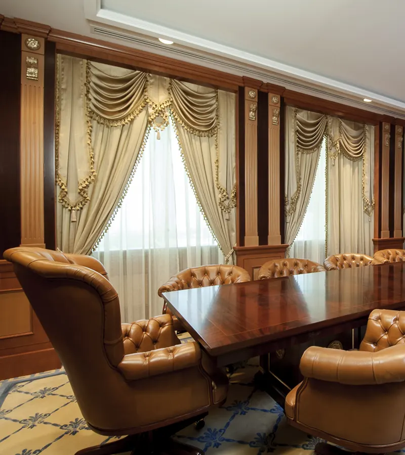 Classic executive meeting room furniture with luxury wood finishes and premium seating