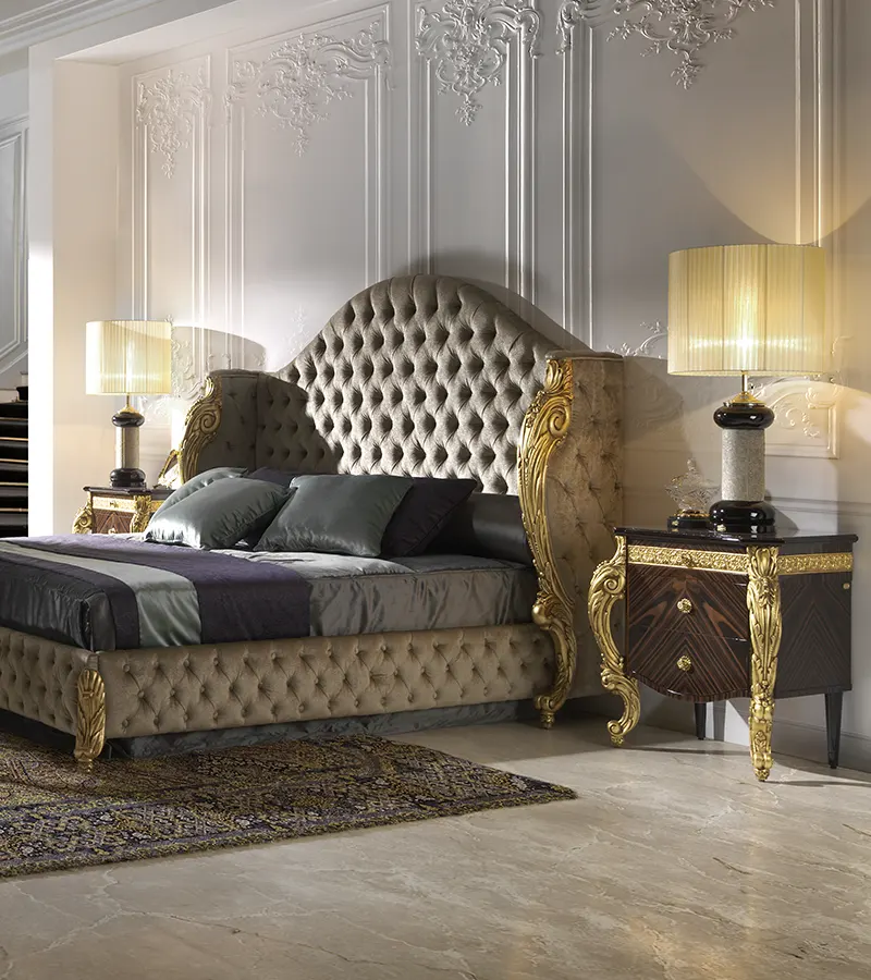 Handcrafted luxury bed with gold details featuring premium upholstery, carved wood elements and elegant bedroom design